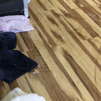 Lemon Grove Coin Laundry - Water on the floor towels used to "stop" the water - Laundromat Near Me - Lemon Grove, California Lemon Grove Coin Laundry - Water on the floor towels used to "stop" the water - Laundromat Near Me - Lemon Grove, California