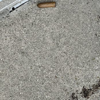 Cream City Cleaning - A used cigar and the marks where they snuffed it out on the concrete. - Office Cleaning Near Me Cream City Cleaning - A used cigar and the marks where they snuffed it out on the concrete. - Office Cleaning Near Me