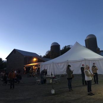 S and S Farm Brewery - a group of people standing under a tent - Breweries Near Me - Nassau, New York