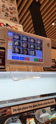 Kura Revolving Sushi Bar by null