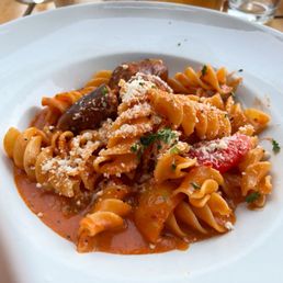 Speakin' of the devil Look who just walked on in  Fusilloni (large corkscrew pasta, Italian Sausage, Roasted Bell Peppers, & Vodka Sauce)