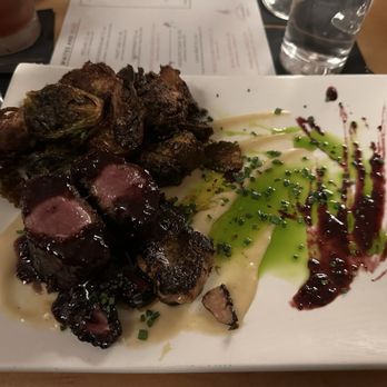 Restaurant IRON - Roasted duck breast on foie gras with Brussels sprouts - Southern Near Me - Pensacola, Florida