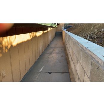 Building Hard Concrete - Drainage system and retaining wall - Masonry/Concrete Near Me