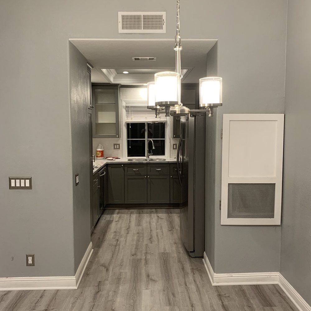 a view of a kitchen and dining room
