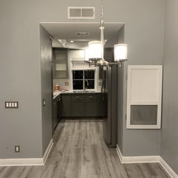 a view of a kitchen and dining room a view of a kitchen and dining room