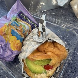 Tuna Salad Sandwich on a croissant (avocado added) & chips Tuna Salad Sandwich on a croissant (avocado added) & chips
