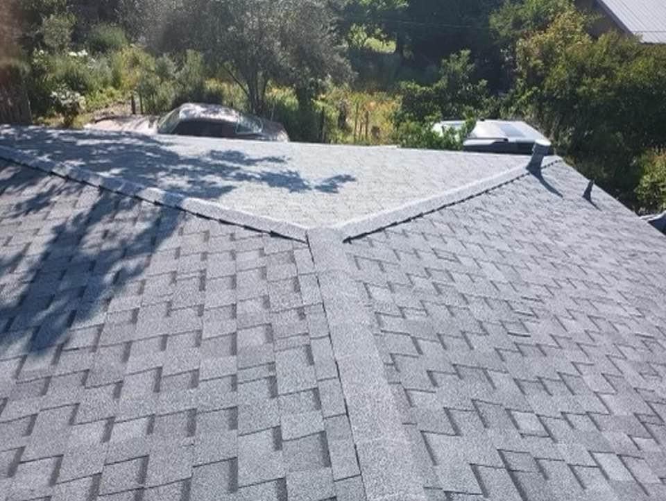 Slide of Caballeros Roofing