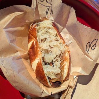 Wursthaus - Vegan apple sage with drunken onions and sauerkraut in a pretzel bun. Delicious! - Pubs Near Me - Santa Ana, California Wursthaus - Vegan apple sage with drunken onions and sauerkraut in a pretzel bun. Delicious! - Pubs Near Me - Santa Ana, California