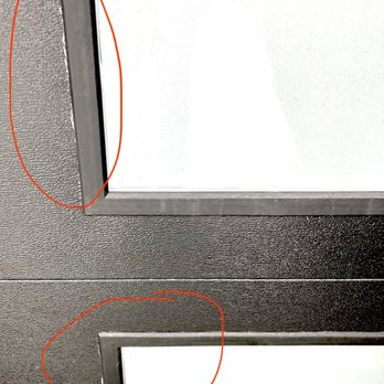 Chicago Garage Door - Glue seepage from sides of windows from CHI door - Garage Door Services Near Me - Arlington Heights, Illinois