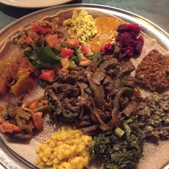 Enat Restaurant - Veggie combo with tibs - Ethiopian Near Me - Alexandria, Virginia Enat Restaurant - Veggie combo with tibs - Ethiopian Near Me - Alexandria, Virginia