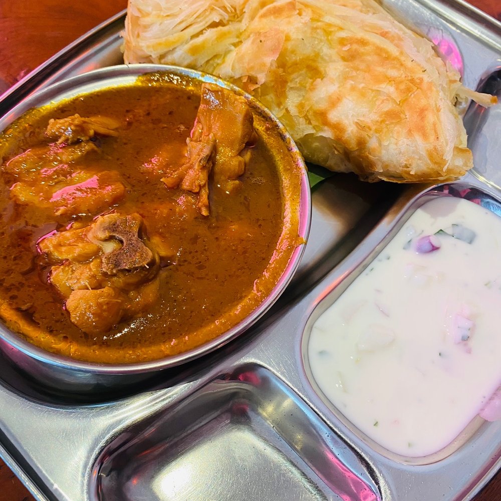 Amma's Kitchen - Parotta with Chicken Curry - Indian Near Me - Edison, New Jersey Amma's Kitchen - Parotta with Chicken Curry - Indian Near Me - Edison, New Jersey