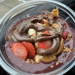 MELTED AND ONE STRAWBERRY WITH A PINCH OF GRANOLA MELTED AND ONE STRAWBERRY WITH A PINCH OF GRANOLA