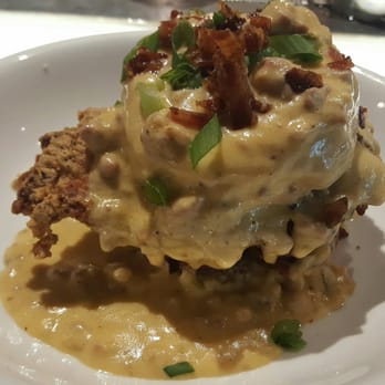 Bourbon - Housemade buttermilk buscuit, andoullie sausage, fried chicken breast, & bourbon smoked bacon snothered in andoullie sausage gravy. - Cajun/Creole Near Me - Columbia, South Carolina Bourbon - Housemade buttermilk buscuit, andoullie sausage, fried chicken breast, & bourbon smoked bacon snothered in andoullie sausage gravy. - Cajun/Creole Near Me - Columbia, South Carolina
