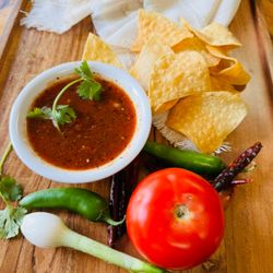 Hacienda Real - Crispy chips with our house-made roasted salsa ~ full of smoky flavor!