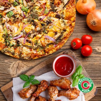 Freshslice Pizza - a pizza with chicken wings and tomato sauce - Pizza Near Me - Vancouver, British Columbia Freshslice Pizza - a pizza with chicken wings and tomato sauce - Pizza Near Me - Vancouver, British Columbia