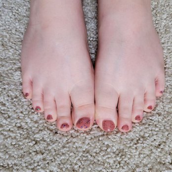 True Nail Studio - Pedicure with dusty pink colored polish and colorful glitter on top. - Nail Salons Near Me - New Braunfels, Texas