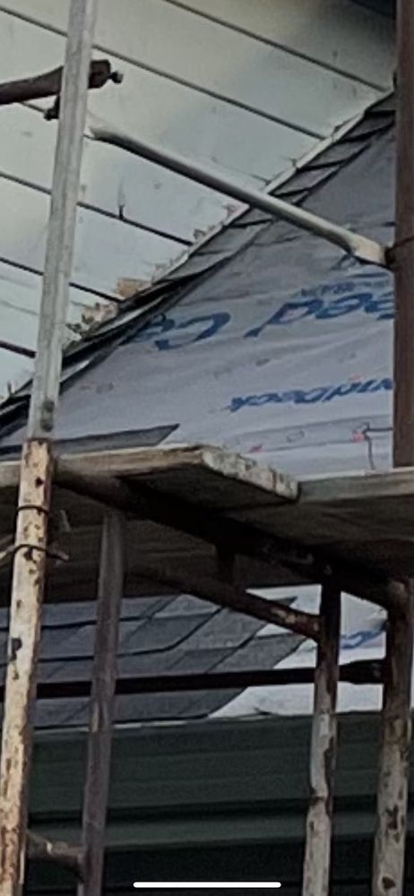 Slide of Al Jr's Roofing