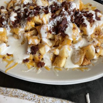 Gaffers - Loaded taters were delicious if you don't mind splurging on some calories! - Bars Near Me - Emerald Isle, North Carolina Gaffers - Loaded taters were delicious if you don't mind splurging on some calories! - Bars Near Me - Emerald Isle, North Carolina