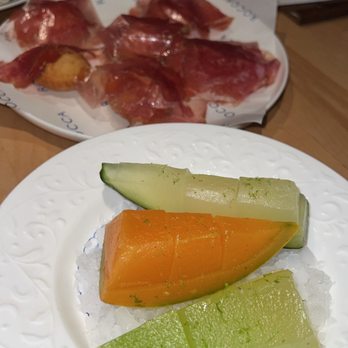 Rocca - Prosciutto puffs with melon. I love melon-so it's in the front (: - Italian Near Me - Tampa, Florida