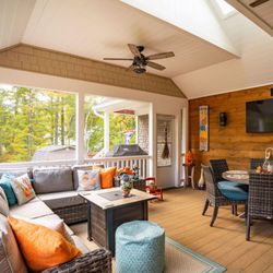 Choice Exteriors - These clients are ready to enjoy their outdoors and backyard in any season with a new roof to protect from sunlight and a screened-in porch!