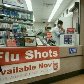 Walgreens - a man standing in a store - Drugstores Near Me - New Orleans, Louisiana