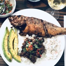A-OK Fish Market - Whole Yellowtail snapper coated in spices, dredged in flour and fried.