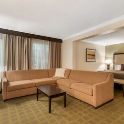 Best Western Plus White Bear Country Inn - Deluxe King Room with Separate Living Room and Sofabed