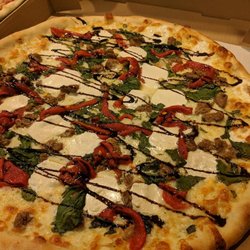 Tomatoes Pizzeria