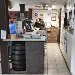 Duncan Heating & Plumbing - Steve Duncan helping a customer on the phone.
