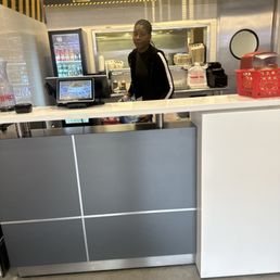 a man behind the counter a man behind the counter
