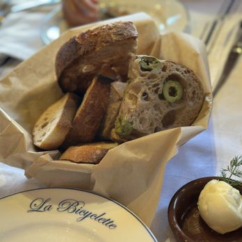 La Bicyclette - Pains assortis. Assorted wood-fired bread with local butter - French Near Me - Carmel, California La Bicyclette - Pains assortis. Assorted wood-fired bread with local butter - French Near Me - Carmel, California