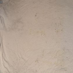 Whitney's Laundromat - My memorabilia shirt that was ruined in Whitney's Washer it came back with different colored mold stops from their dirty washer!!!