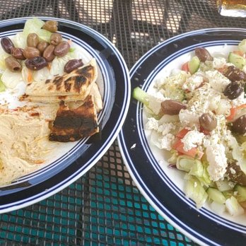 Agora Restaurant - Pita with hummus appetizer and small mixed green Greek salad. - Mediterranean Near Me - Fayetteville, North Carolina