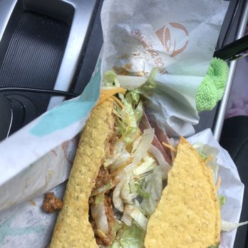 Taco Bell - Taco apparently crumpled by Taco Bell operator whom tossed bags around while bags were sitting on the counter. - Fast Food Near Me - Chula Vista, California Taco Bell - Taco apparently crumpled by Taco Bell operator whom tossed bags around while bags were sitting on the counter. - Fast Food Near Me - Chula Vista, California