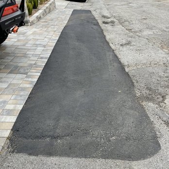 Top Tier Grading & Paving - The rest of this street is unincorporated so not the companies fault. They just helped fix and case in our new paver job ;) - Masonry/Concrete Near Me