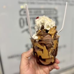 Outlaw's Burger Barn & Creamery - Peanut butter sundae. Piled with toppings. This was a generous medium size.