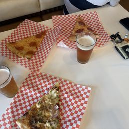 Pizza slices and beers