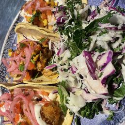 Three a la carte tacos, with a side of kaleslaw Three a la carte tacos, with a side of kaleslaw