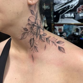 Angel Tattoo - Neck tattoo, pain 0/10 - Piercing Near Me - Tampa, Florida