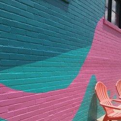 Side of the building! Pink dog...