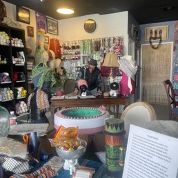 Everyone sits around this one of two tables and socializes! They also hist knitting classes here! Everyone sits around this one of two tables and socializes! They also hist knitting classes here!