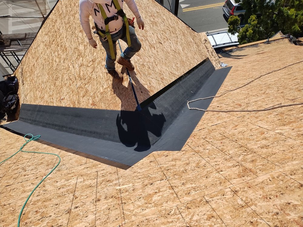 Slide of RR Alvarez Roofing