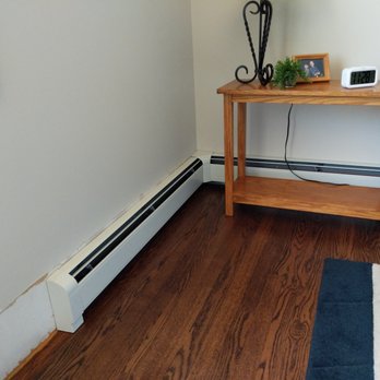 S & R Heating & Cooling - Corner baseboard unit installed to the right side of the new planned sliding doors (which will replace the picture window). - Heating & Air Conditioning/HVAC Near Me S & R Heating & Cooling - Corner baseboard unit installed to the right side of the new planned sliding doors (which will replace the picture window). - Heating & Air Conditioning/HVAC Near Me