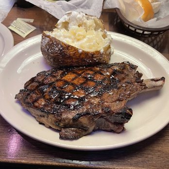 Texas Roadhouse - Bone-in Ribeye and baked potato - American Near Me - Henderson, Nevada Texas Roadhouse - Bone-in Ribeye and baked potato - American Near Me - Henderson, Nevada