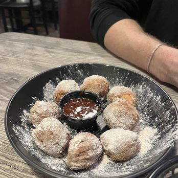 House Taco - a plate of doughnuts and dipping sauce - Tacos Near Me - Columbus, Ohio