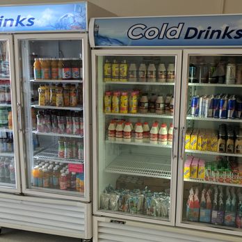 Super Donuts - a cold drinks display in a store - Donuts Near Me - Minden, Louisiana