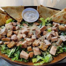 Too many croutons, not enough lettuce and chicken (which was dry). Dressing is creamy, not anchovy based. Looked better than it tasted. Too many croutons, not enough lettuce and chicken (which was dry). Dressing is creamy, not anchovy based. Looked better than it tasted.