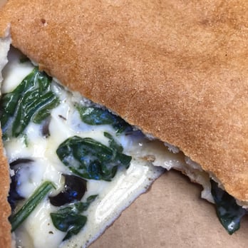 Bella Roma Pizza - White Spinach Calzone + black olives - Italian Near Me - Knoxville, Tennessee
