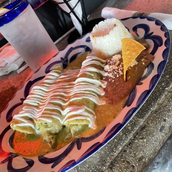 Oh! Mexico - Chicken Enchiladas with green sauce. Wasn't spicy at all - Mexican Near Me - Miami Beach, Florida Oh! Mexico - Chicken Enchiladas with green sauce. Wasn't spicy at all - Mexican Near Me - Miami Beach, Florida