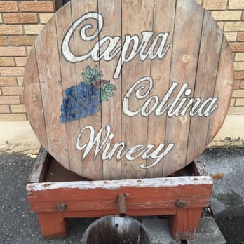 Capra Collina Winery - a wooden barrel with a sign that reads capra collina winery - Wineries Near Me - Blakely, Pennsylvania Capra Collina Winery - a wooden barrel with a sign that reads capra collina winery - Wineries Near Me - Blakely, Pennsylvania